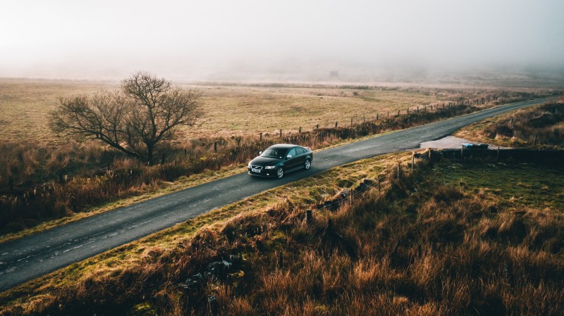 car driving through countryside